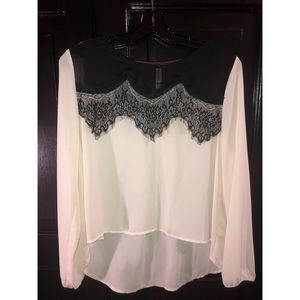 White blouse with black lace inset